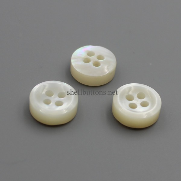 R-side double white MOP shell buttons
