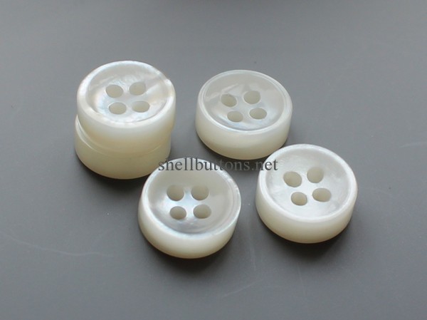 double white MOP shell buttons with concave face