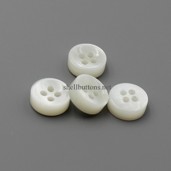 double white MOP buttons with concave face