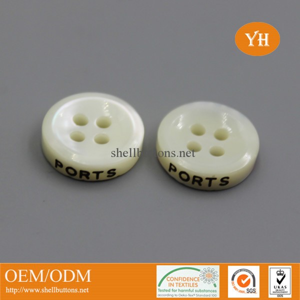 engraved trocas/trochus shell buttons with brand logo