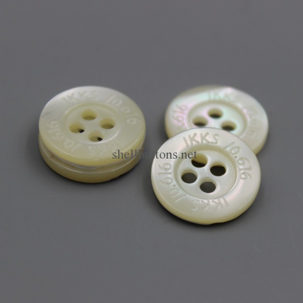 natural trocas shell button with wide rim and logo