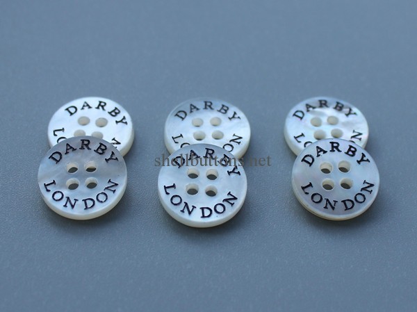 shell buttons with oiling logo