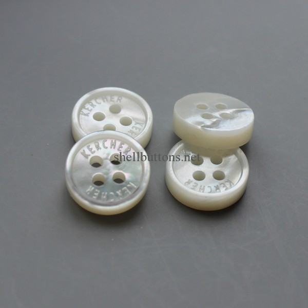 small rim white mop shell buttons with logo
