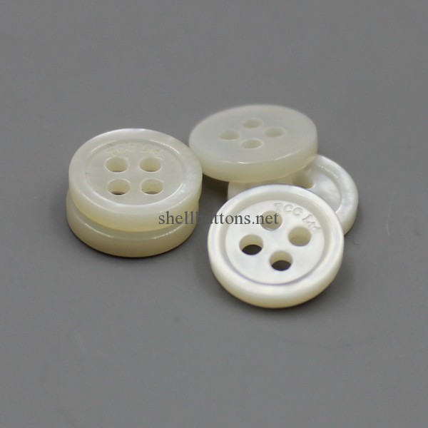mother of pearl buttons with brand logo